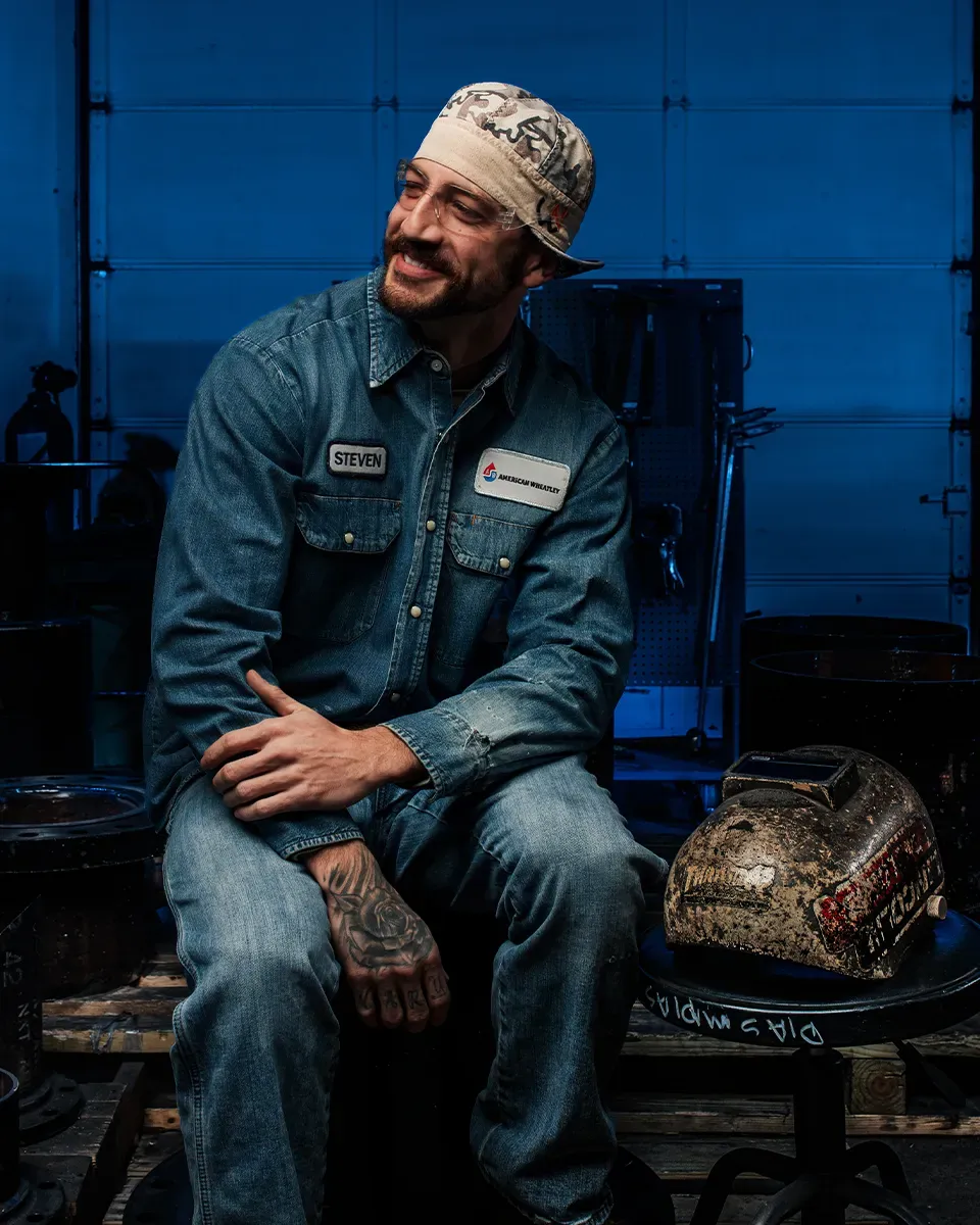 American Wheatley lead welder Steven Gulley seated inside the fabrication facility in Tulsa.