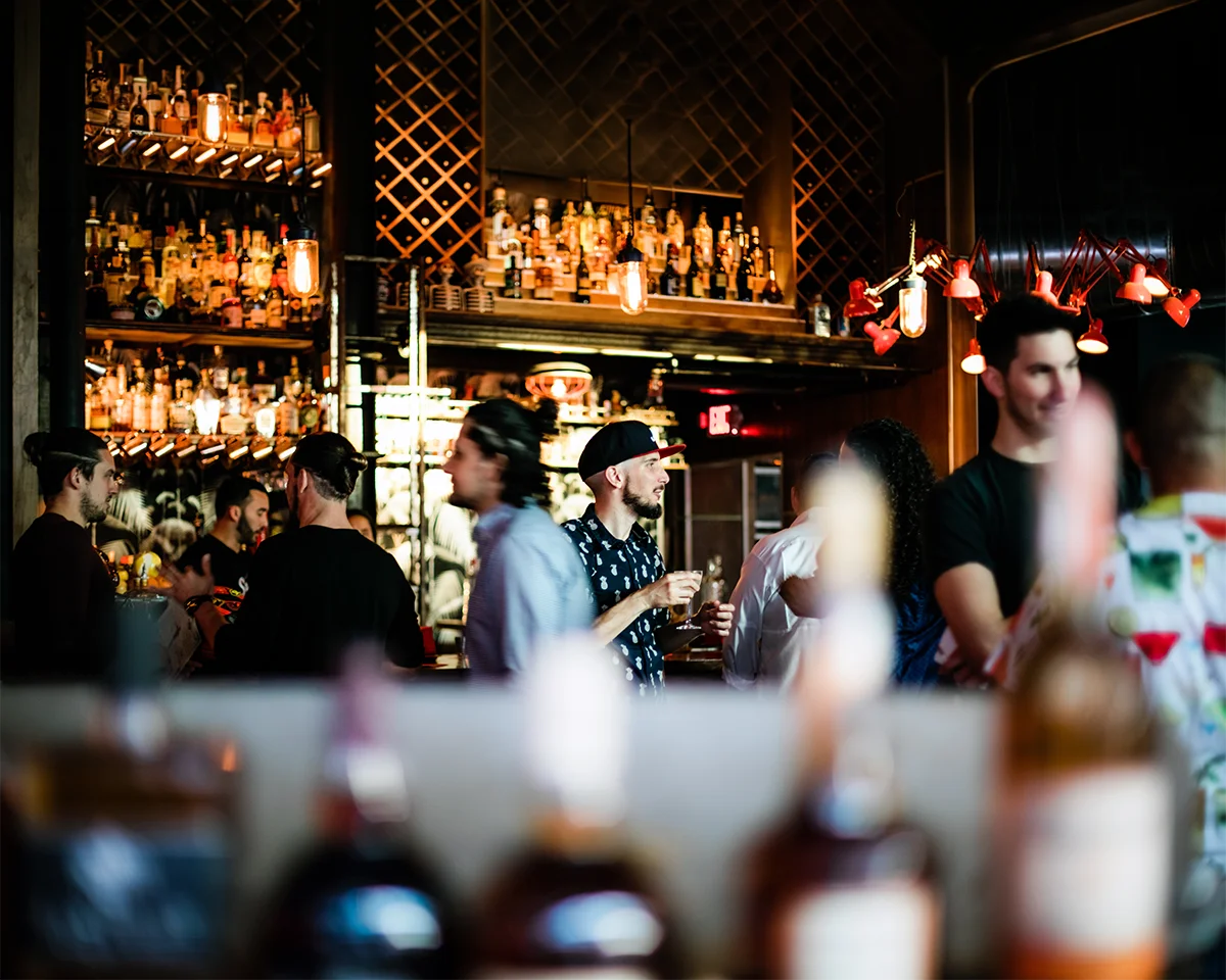 Guests at a spirits tasting at Sweet Liberty in Miami Beach photographed for Chilled Magazine.