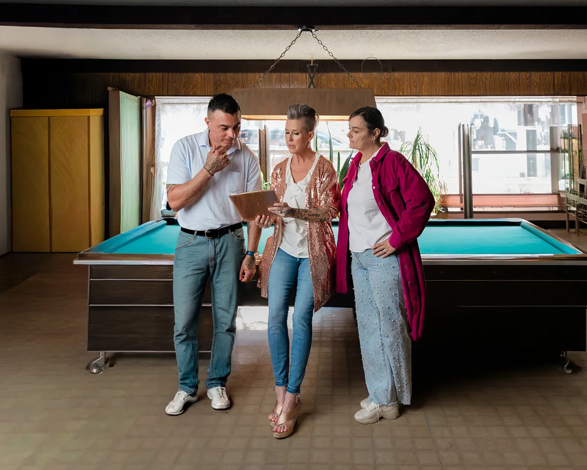 Realtor Lisa Goulet meeting with her team during a Real Producers editorial feature about her probate real estate work.