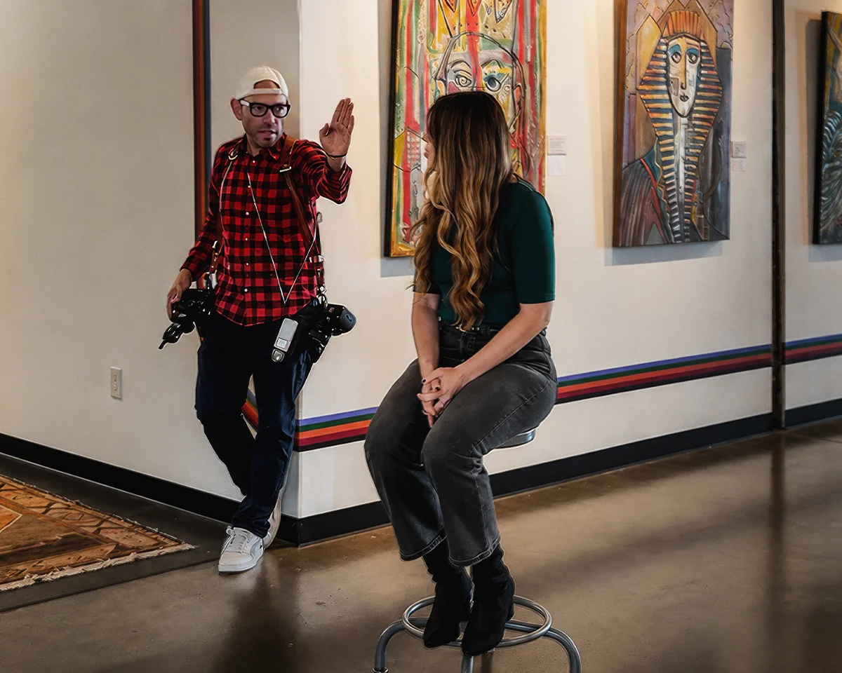 Erik Esparza directing a Tulsa Realtor during a branding and lifestyle portrait session at WOMPA.